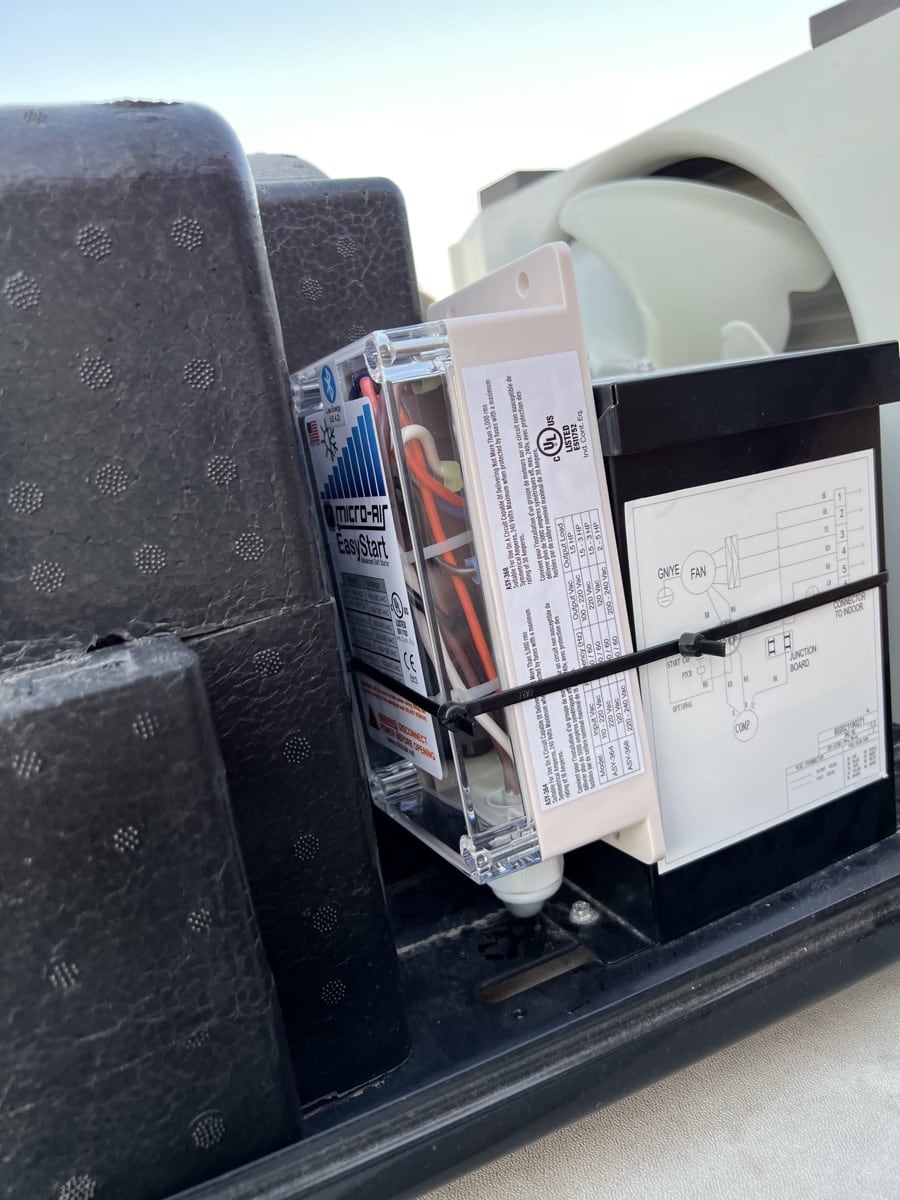 Installing the Easy Start under the air conditioner shroud